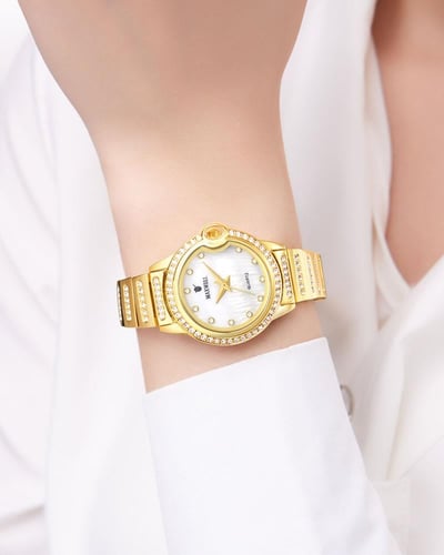 ساعة يد نسائية لون ذهبي فاخر مزينة بالزركون مينا أ...