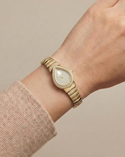 ساعة خاتون® الذهبية بتصميم قطرة الندى