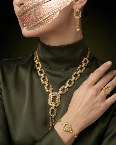 طقم مجوهرات نسائية تصميم متشابك ببريق الذهب