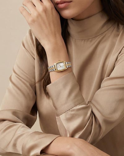 ساعة يد خاتون® النسائية تصميم فضي ذهبي مقاوم للصدأ