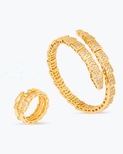 طقم من اسوارة وخاتم مرصع بالزركون تصميم ذهبي