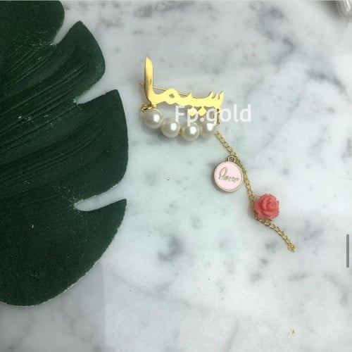 بروش مطلي ذهب مع لولو وتعليقه love وورده