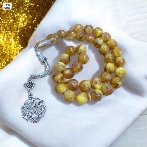 سبحة أكريليك باللون الذهبي