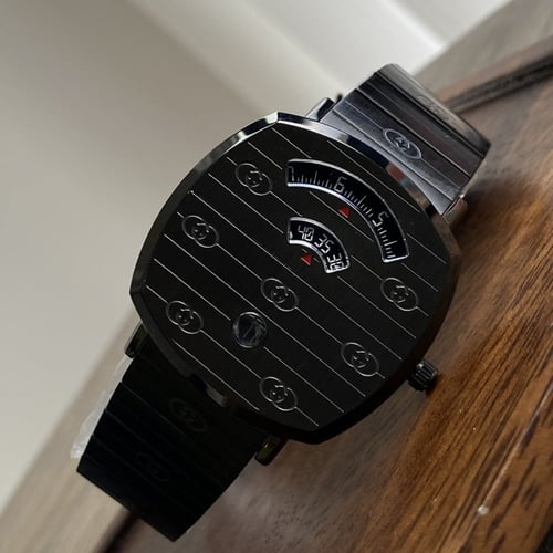 ساعة قوتشي طبلون