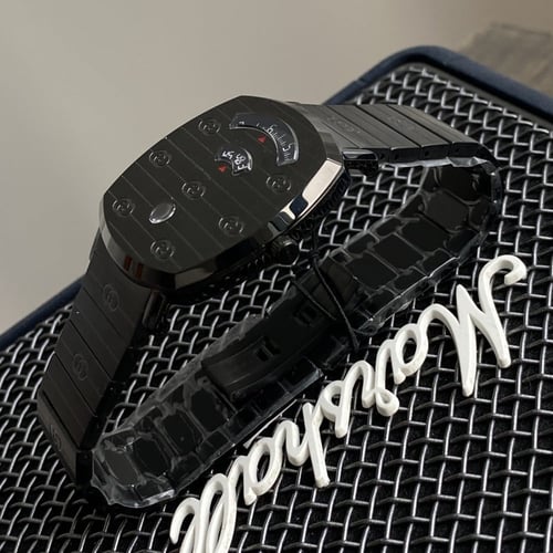 ساعة قوتشي طبلون