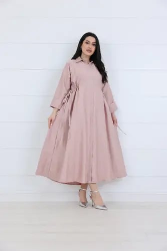 فستان جورسيه سادة خربزي ياقة كلاسك مزين بزم ربط عل...