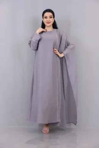 فستان جورسيه سادة مزين بكم لينن فراشة على الجهة ال...