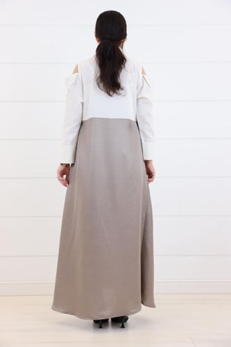 فستان جورسية لامية بلمع مع ياقة مزينة بتطريز لامع...