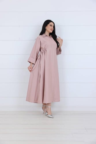 فستان جورسيه سادة خربزي ياقة كلاسك مزين بزم ربط عل...
