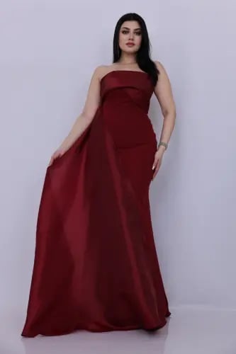 فستان سهرة عنابي باستيل بتصميم راق ووشاح انسيابي