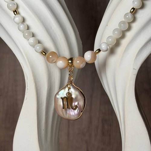 قلادة اللؤلؤ والصدف مع تعليقة برج من اختيارك – نعو...