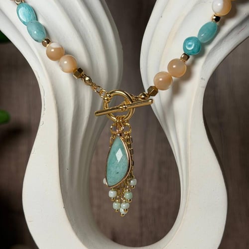 قلادة الصدف والأمازونيت – صفاء، توازن، وطاقة هادئة