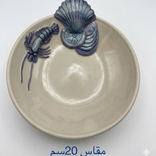 صحن سيراميك منحوت يدوياً