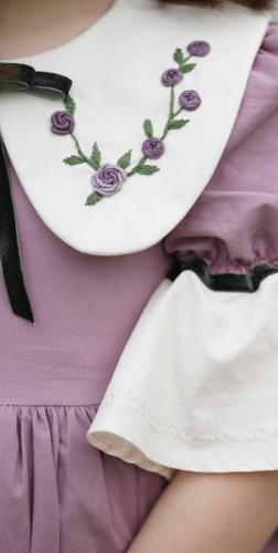 فستان بنفسجي تطريز يدوي مع اكسسوار الشعر