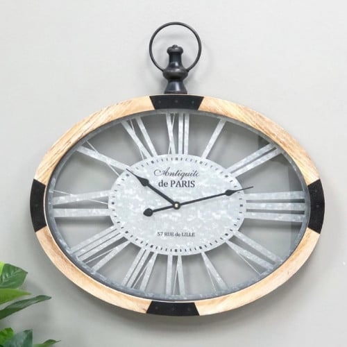 ساعة جدارية حديد اطار خشب تعمل بالبطارية