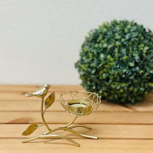 شمعدان ذهبي غصن شجرة مع عصفورة