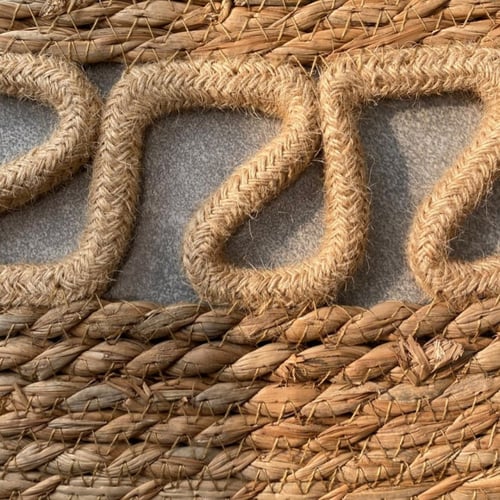 مفرش ارضى دائري مصنوع من مادة القش