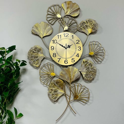 ساعة ولوحه جدارية حديد مطلية باللون الذهبي مع اغصا...