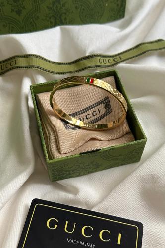 اسوارة قوتشي ذهبي