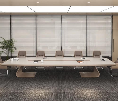 طاولة اجتماعات مع كراسي جلد ثابتة بتصميم راقي