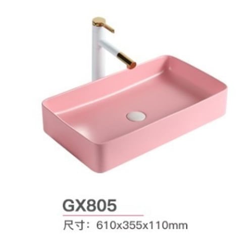 حوض الغسيل السيراميكي المربع باللون الوردي.