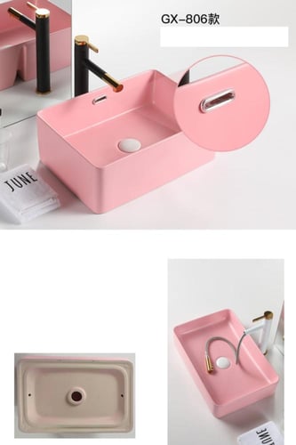 حوض الغسيل السيراميكي المربع باللون الوردي.