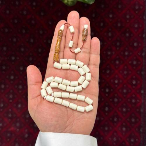 مسباح عظم جمل مع كوك