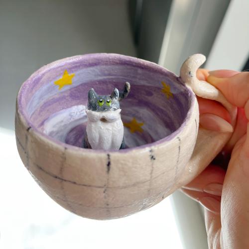 كوب القط الحكيم