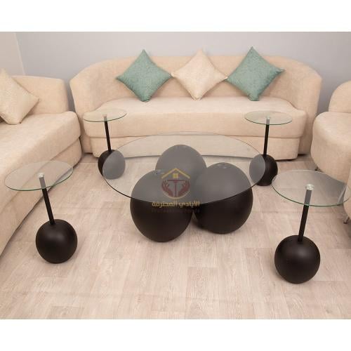 طقم طاولات رخام صناعي شكل كوره لون اسود سطح زجاج