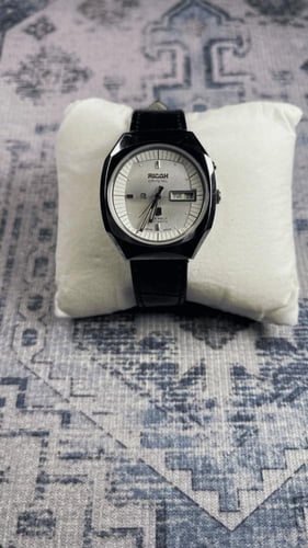 ساعة ريكو اليابانية الكلاسيكية (ڤنتج) بسوار أسود م...