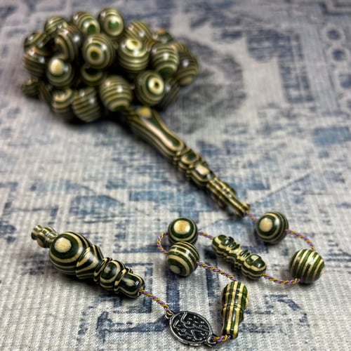 مسبحة خشب مضغوط