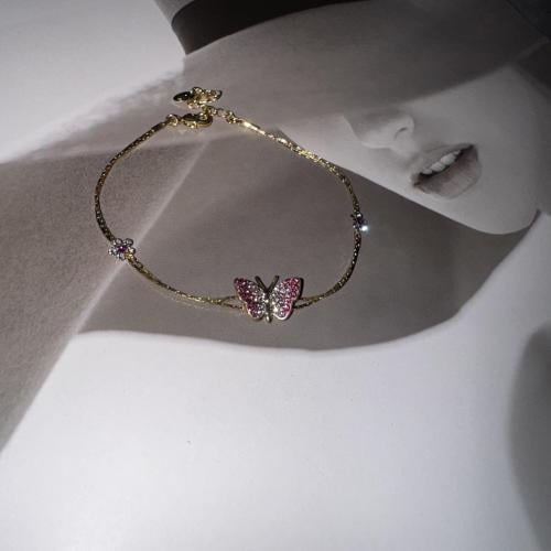 أسورة مطلي بالذهب مرصع زركون اللون ذهبي