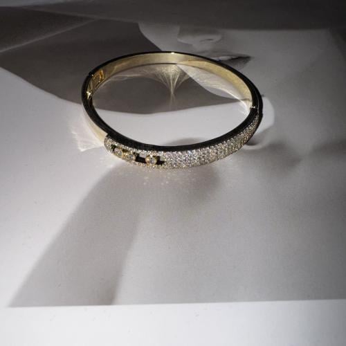 أسورة ماركة ميسيكا مطلي بالذهب مرصع زركون