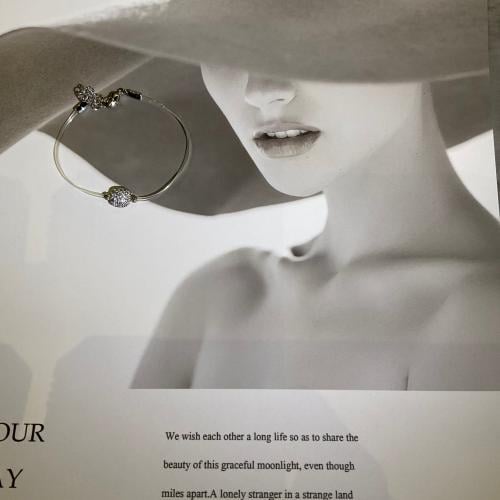 أسورة مطلي بالذهب مرصع زركون اللون ابيض