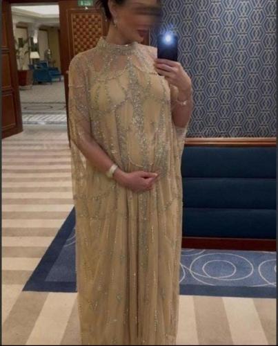 Maternity dress with hand embroidery and elegant d...