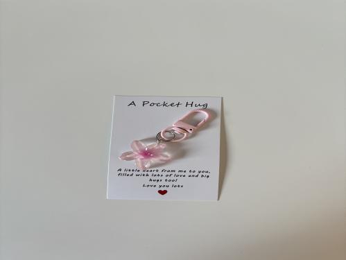 تعليقة زهرة لون وردي فاتح