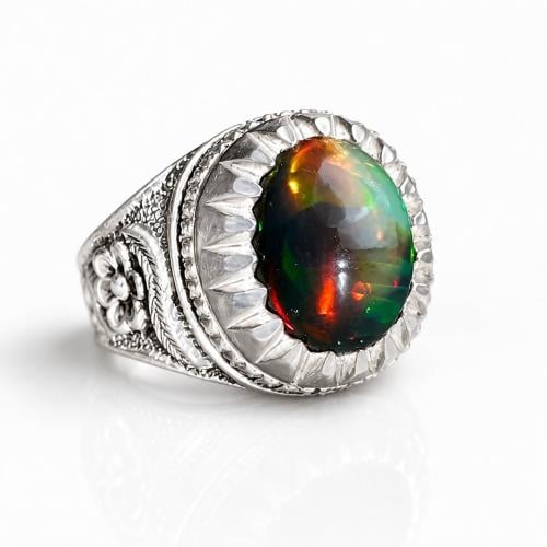 Green opal ring with fire