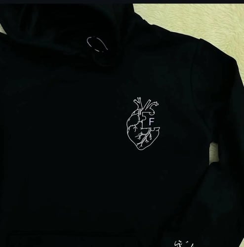 Hoodie with a letter B design inside the heart