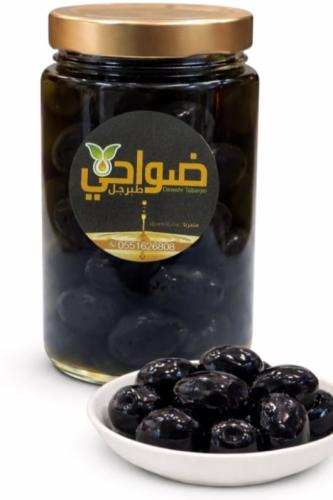 الزيتون الأسود المكبوس بزيت الزيتون البكر بدون اي...