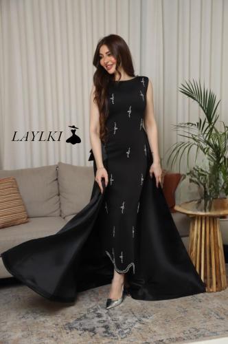 Black dress with royal train and embroidery without sleeves