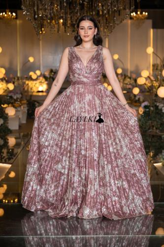 A pink dress printed with luxurious pleats