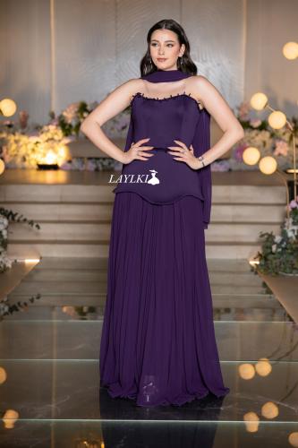 Evening dress with soft pleats