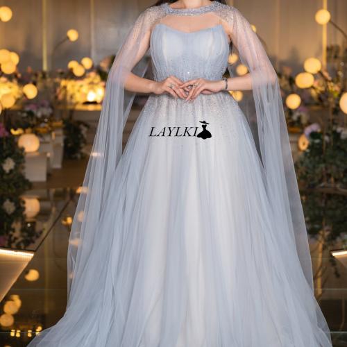 Sky blue tulle dress with luxurious cape
