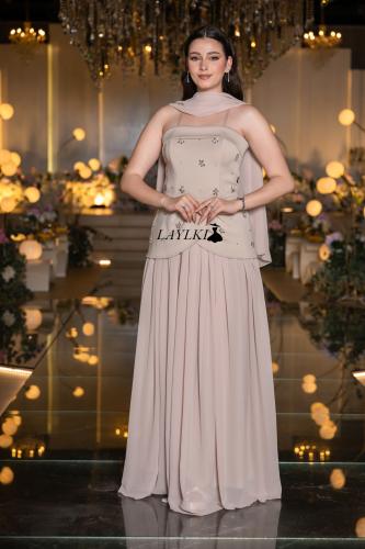 Soft beige dress with light embroidery and elegant flow