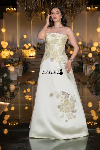 Off-white dress embroidered with luxurious golden flowers