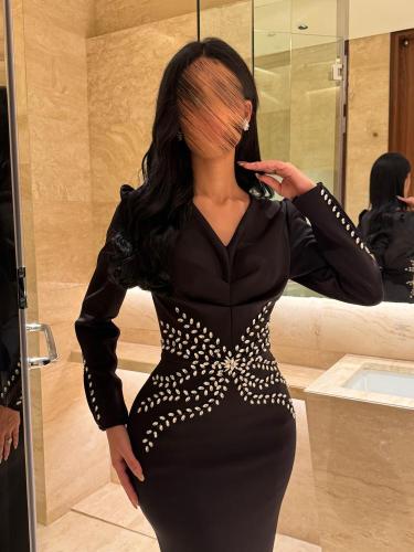 Black dress decorated with luxurious crystal