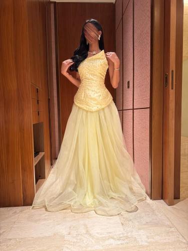 Light yellow dress with luxurious embroidered tulle design