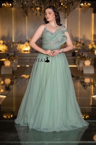 Light green dress with soft tulle layers
