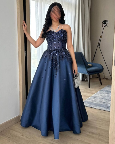Navy blue dress embroidered with a corset design