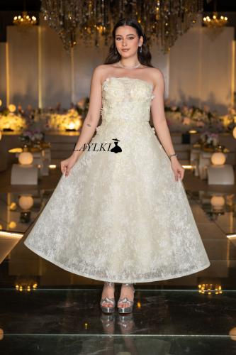 Off white dress embroidered with delicate luxurious details